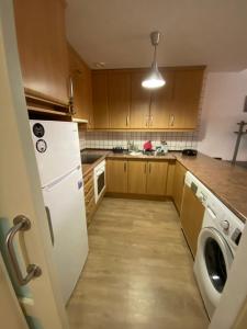 Kuchyňa alebo kuchynka v ubytovaní Vivienda Vacacional Krises