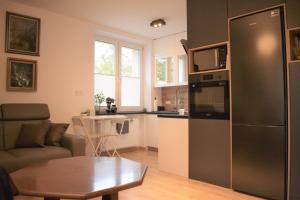Kuchyňa alebo kuchynka v ubytovaní Apartament u Janka