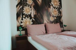 Uma cama ou camas num quarto em Hotel Alf