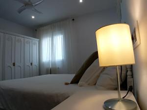 A bed or beds in a room at Balcón del Cardenal