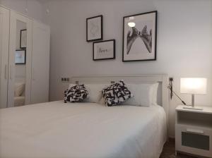 A bed or beds in a room at Balcón del Cardenal