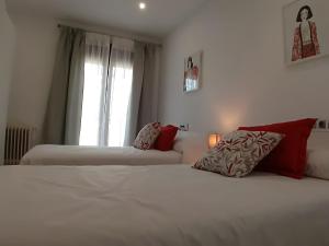 A bed or beds in a room at Balcón del Cardenal