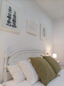 A bed or beds in a room at Balcón del Cardenal