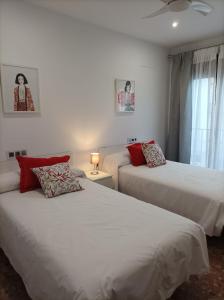A bed or beds in a room at Balcón del Cardenal
