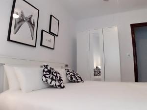 A bed or beds in a room at Balcón del Cardenal