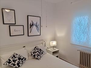 A bed or beds in a room at Balcón del Cardenal