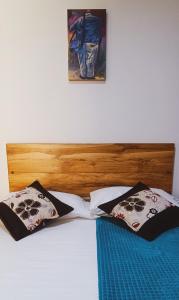 Postel nebo postele na pokoji v ubytování Famy Hostal Nardo's