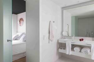 Letto o letti in una camera di Barceló Sants