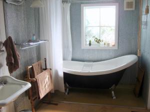 Un baño de Devon Cottage