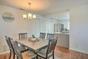 a kitchen and dining room with a table and chairs at Modern Sacramento Home with Yard 12 Mi to Dtwn in Rancho Cordova