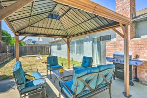 a patio with chairs and a table and a grill at Modern Sacramento Home with Yard 12 Mi to Dtwn in Rancho Cordova