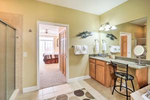 a bathroom with a sink and a mirror at Scenic Views! Ski-In/Ski-Out Condo in Beech Mtn in Beech Mountain +22 photos
