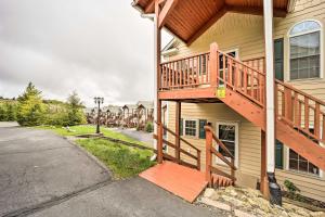 a deck on the side of a house at Scenic Views! Ski-In/Ski-Out Condo in Beech Mtn in Beech Mountain
