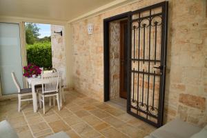 Balcone o terrazza di Trullo delle Querce Suite Private Pool