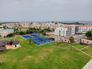 an aerial view of a city with buildings and a park at Albufeira Paradise in Albufeira