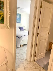 Postel nebo postele na pokoji v ubytování Casa del corso