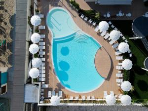 an overhead view of a swimming pool at a resort at Nautilus Family Hotel in Pesaro