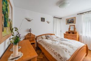 Posteľ alebo postele v izbe v ubytovaní Apartament Zakopane