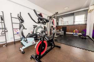 a gym with two exercise bikes in a room at Hotel Bys Palermo in Buenos Aires