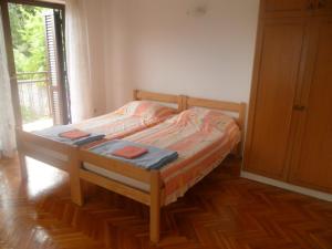 Postel nebo postele na pokoji v ubytování Apartments Placovici