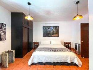 Hotel Boutique Casa Catalá客房内的一张或多张床位