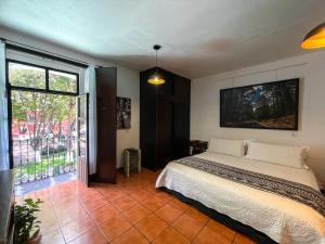 Hotel Boutique Casa Catalá客房内的一张或多张床位