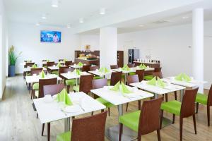 Restoran ili neka druga zalogajnica u objektu Good Rooms GmbH Guntramsdorf