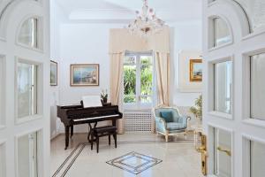 A seating area at Hotel Villa Garden