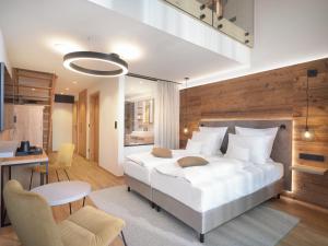 Ένα ή περισσότερα κρεβάτια σε δωμάτιο στο Hotel Bütgenbacher Hof +82 φωτογραφίες