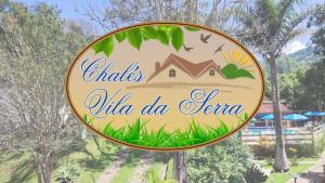 a sign for a villa do tifa at Chalés Vila da Serra in Serra Negra