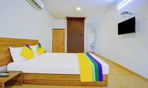 TV a/nebo společenská místnost v ubytování Itsy Hotels Oasis Pride + 20 fotografií