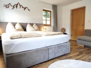 Letto o letti in una camera di Das Ihäusl