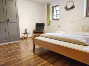 Letto o letti in una camera di Das Ihäusl