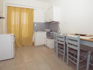 Kuchyň nebo kuchyňský kout v ubytování Memi Houses