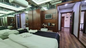 Postel nebo postele na pokoji v ubytování Mavisu Deluxe Butik Otel