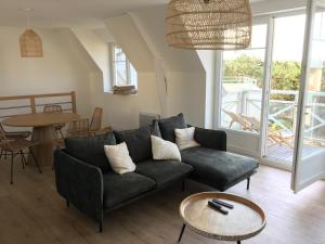 Posedenie v ubytovaní Nouveau! Superbe appartement avec terrasse vue mer