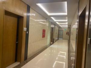 a hallway of a hospital with a hallwaygue at قرين فيو in Abha