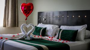 Posteľ alebo postele v izbe v ubytovaní Ecohotel Talca