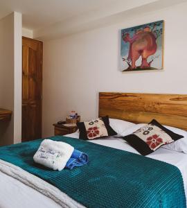 Postel nebo postele na pokoji v ubytování Famy Hostal Nardo's