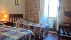 Postel nebo postele na pokoji v ubytování Casa grande cerca de la playa