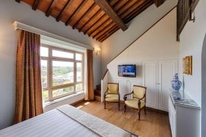 Łóżko lub łóżka w pokoju w obiekcie Hotel Mulino di Firenze - WorldHotels Crafted