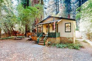 a small house in the middle of a forest at Clearheart Grove in Guerneville
