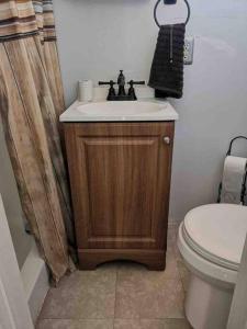 a bathroom with a sink and a toilet at The Gnome Home SEDONA'S MOST VISITED in Sedona