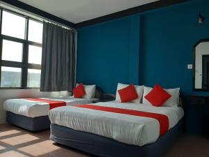 Postel nebo postele na pokoji v ubytování G CITY HOTEL + 37 fotografií