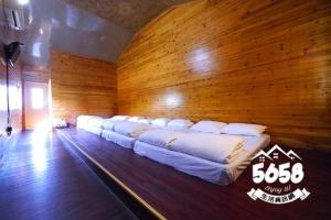 Postel nebo postele na pokoji v ubytování Shan Shui Yan Homestay + 4 fotografie