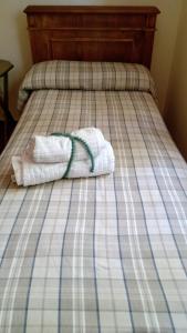 Ein Bett oder Betten in einem Zimmer der Unterkunft Acogedora Habitación individual, privada y luminosa en Mendoza