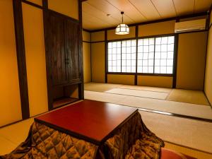 Postel nebo postele na pokoji v ubytování Hakone Onsen Yuyado Yamanoshou