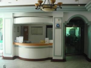 a restaurant with a counter in a building at Galcheon Family Resort in Yangyang