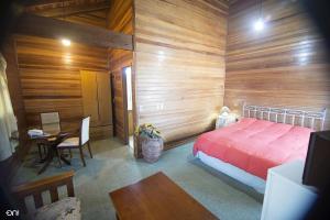 Postel nebo postele na pokoji v ubytování Hotel Termal Dayman