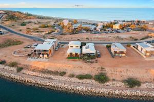 an aerial view of a resort next to the water at 136 Madaffari Drive in Exmouth